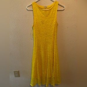 Yellow lace dress.